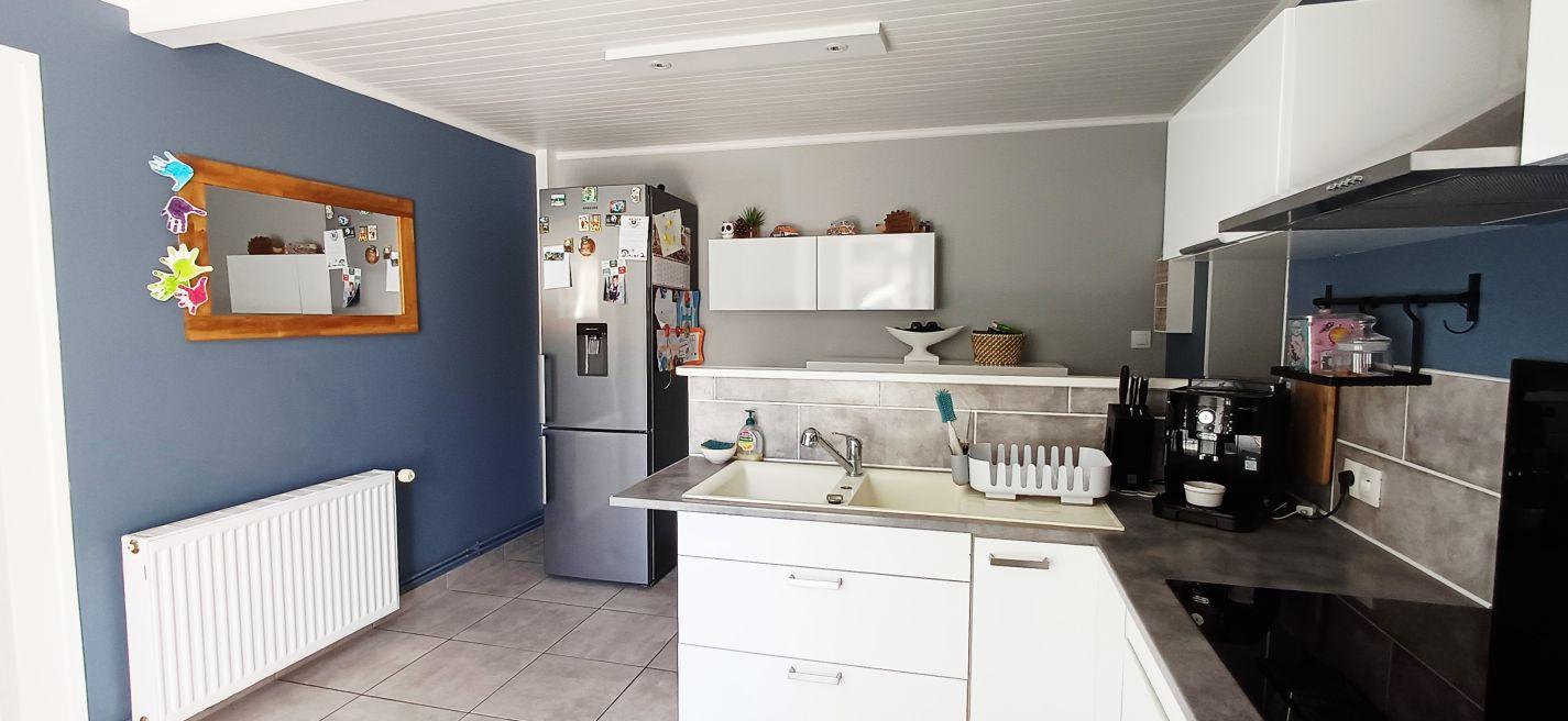 famicity orangée Immobilier.png