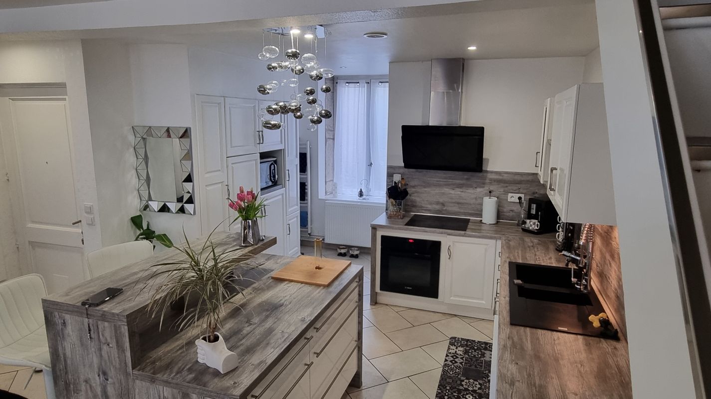 famicity orangée Immobilier.png